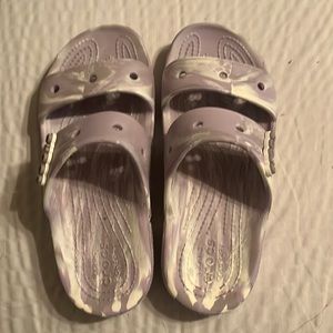 Crocs slides never worn.1 pair purple, 1 pair green. Size 7 bought wrong size.